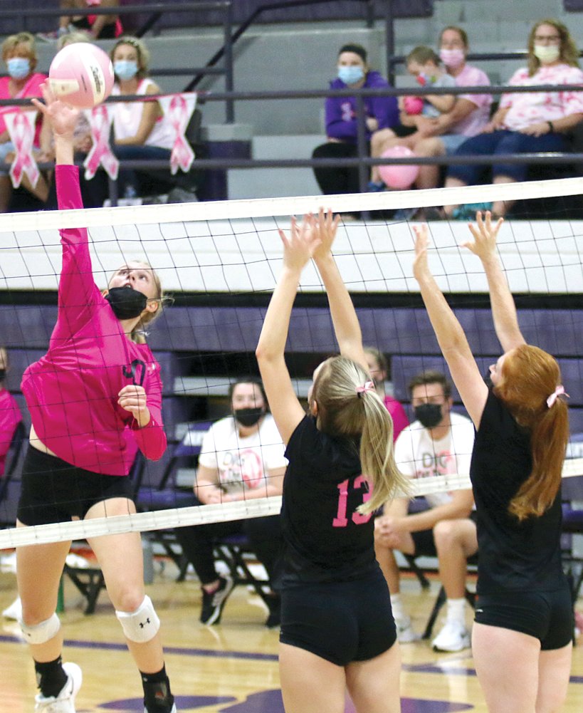Litchfield’s Annika Rhodes elevates to put a hit on a ball at the net as Lincolnwood’s Haelee Damm (#13) and Sidney Glick loom on the other side. Lincolnwood would get the better of the Panthers in Monday’s Dig For A Cure game, beating Litchfield 25-12, 25-19.