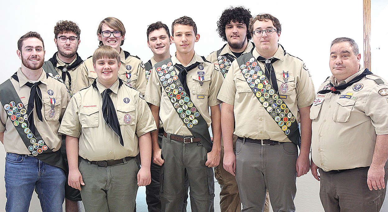 Eight members of Boy Scout Troop #77, The Thunder Toads, were recognized as Eagle Scouts on Sunday, Nov. 28. In front, from the left, are Graham Gunn, Bryce Wolf, Charlie Corso, Levi Weir and Scoutmaster David Wolf. In back, from the left, are John Wolf, Austin Page, Nicholas Probst and Silas Weir.